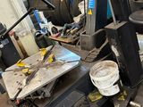 an image of a machine that is in a garage
