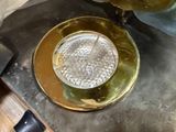 a bowl of water sitting on top of a stove