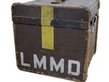 an old trunk with the word lmmd painted on it