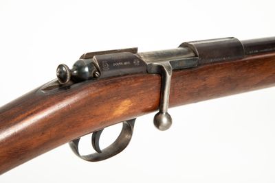 a close up of a rifle on a white background with a white background