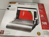 a picture of a manual bindinger in a box