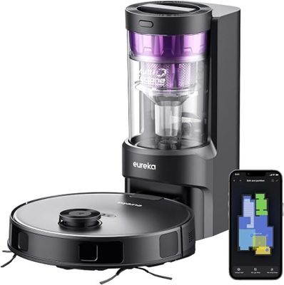 une image représentant un mixeur noir et violet à côté d'un téléphone portable