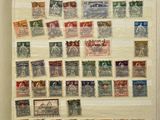 a picture of a fridge with a lot of stamps on it