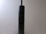 an image of a black vacuum cleaner sitting on top of a white counter