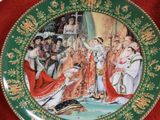 a plate with a picture of a royal couple on it