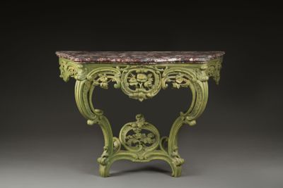une table verte avec un plateau en marbre sur fond noir