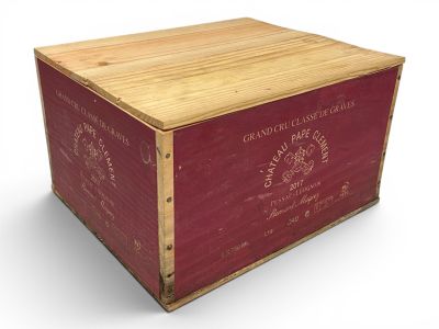 a wooden box that has a wine label on it