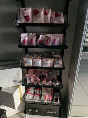 a shelf with a lot of money on it in a store