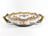 an image of a bowl with a handle on it