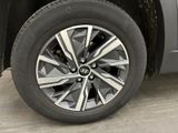 a close up view of a tire on a vehicle