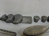 a lot of silver items that are on a table