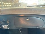 an image of a car dashboard with the door open