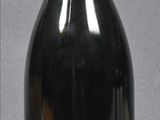 a bottle of wine that is sitting on a table