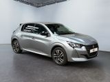 the silver car is parked in a white room with a black floor