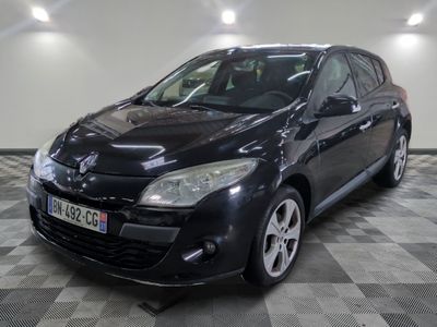a picture of a black car parked in a garage