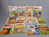 a lot of children ' s books sitting on a table