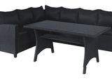 a black patio furniture set with a table and chairs