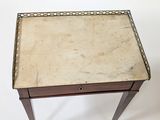 an image of a small table with a drawer on top of it