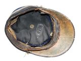 a brown hat with a black patch on it