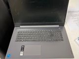 a laptop computer sitting on top of a table