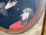 painting of a man in a black coat holding a cigarette
