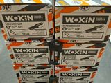 a stack of boxes with a pair of scissors on top of them