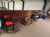 an image of a garage with a red chair in it