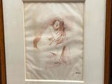 painting of a woman holding a child in her arms in a wooden frame