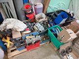 a pile of assorted items sitting on a pallet