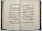 an open book with a picture of a cat on it