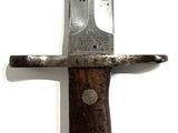 a knife that is hanging on the wall