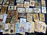 a lot of old postcards on the table