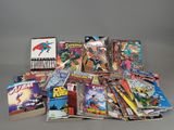 a lot of comic books sitting on a table