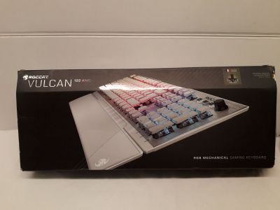 a box with a keyboard inside of it on a table