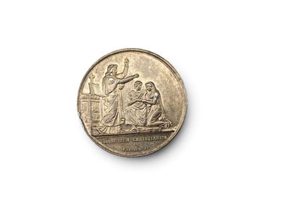 une image représentant une pièce de monnaie sur laquelle figurent Jésus et Marie