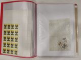 a picture of a book with stamps inside of it