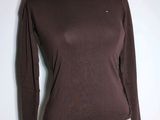 brown long sleeved shirt on a mannequin mannequin mannequin mannequin mannequin mannequin mannequin mannequin mann