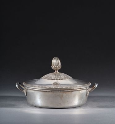 an antique silverplated casserole with a domed lid