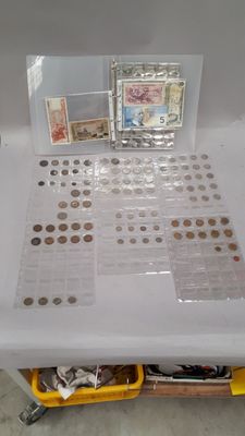 a table with a lot of coins on top of it