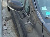 a car that is parked on the side of the street