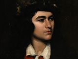 portrait d'un jeune homme portant un gilet rouge et une chemise à col blanc