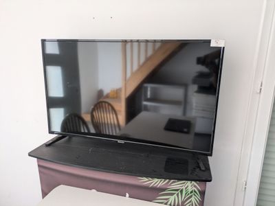 a laptop computer sitting on top of a desk