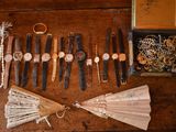 many different types of jewelry on the table