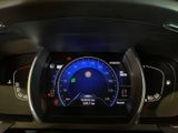 the dashboard of a car with a digital display on it