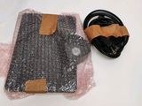 a piece of plastic that has been wrapped up and is sitting on a table