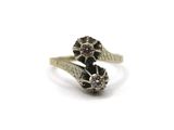 an image of a close up of a ring on a white surface