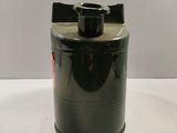a black canister sitting on a table with a white background