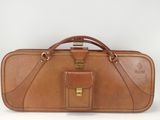 brown leather suitcase on white background with handle and strap