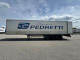 a semi truck that is parked in a parking lot