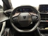 the interior of a car with a steering wheel and dashboard controls